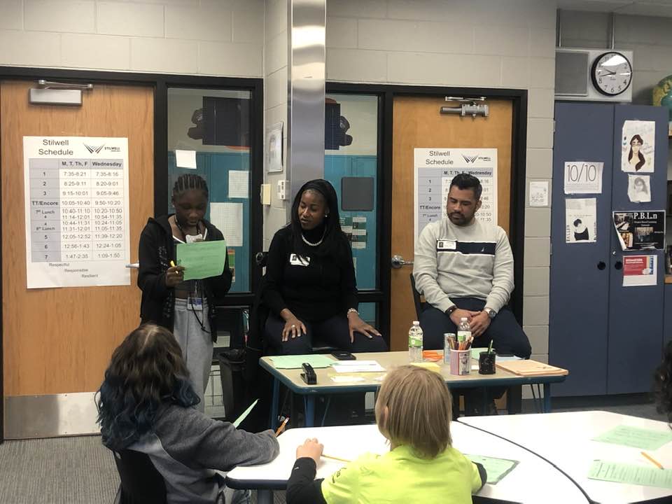 group of three speakers presenting at Stilwell Jr. High