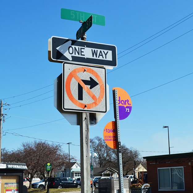 Bus Stop Sign near stop sign