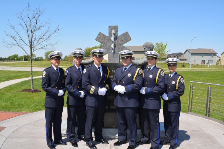 Honor guard in front of memorial